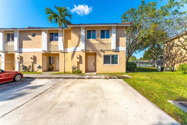 a view of a building with a street