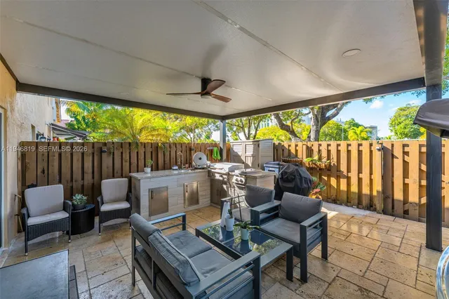 a outdoor living space with furniture and garden view
