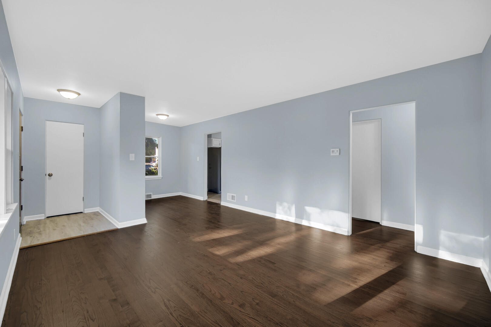 3816 Lincoln Street Gary, IN 46408 - Photo 5 of 21 a view of an empty room with wooden floor