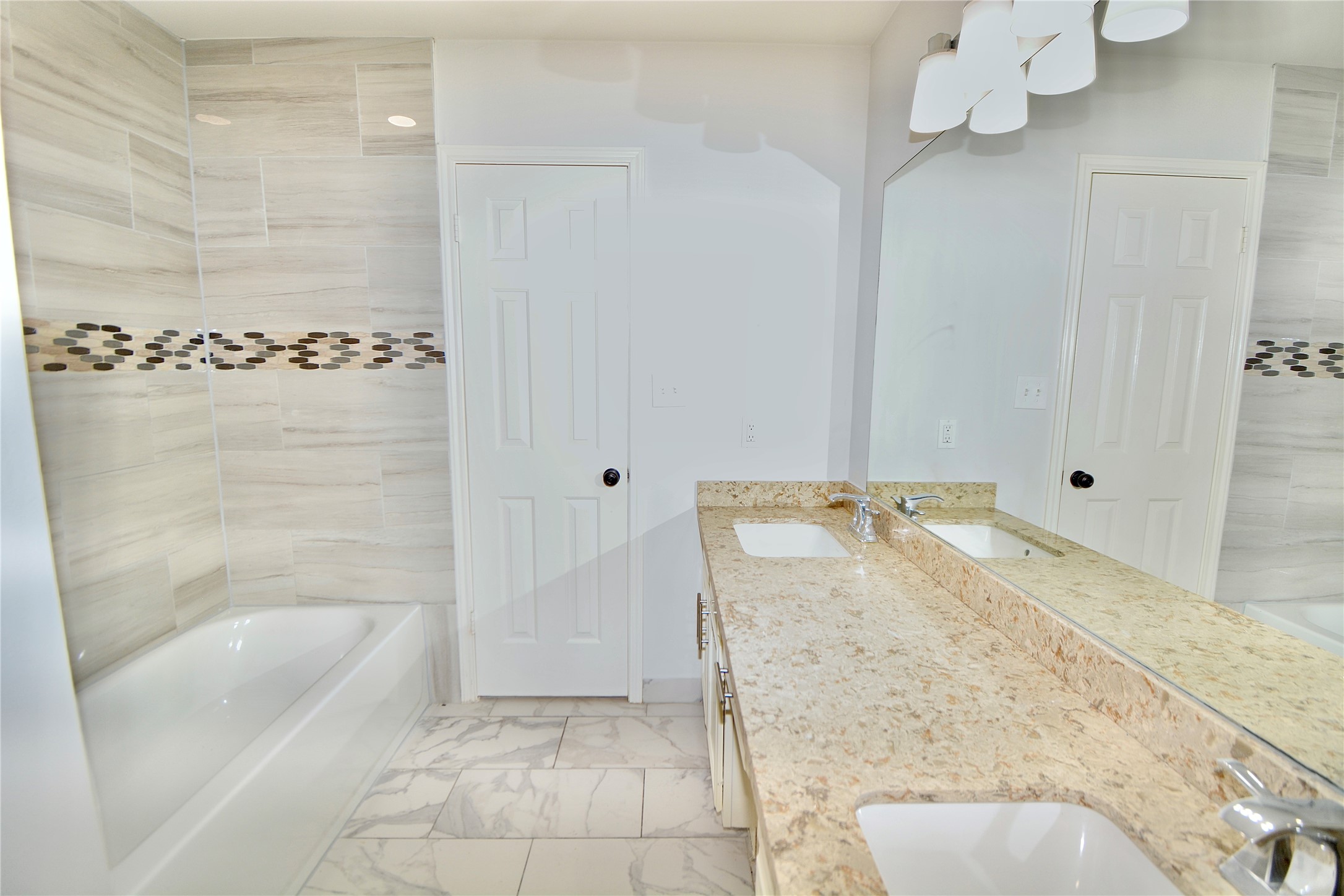 2020 Ward Street Rosenberg, TX 77471 - Photo 11 of 19 a bathroom with a bathtub and shower