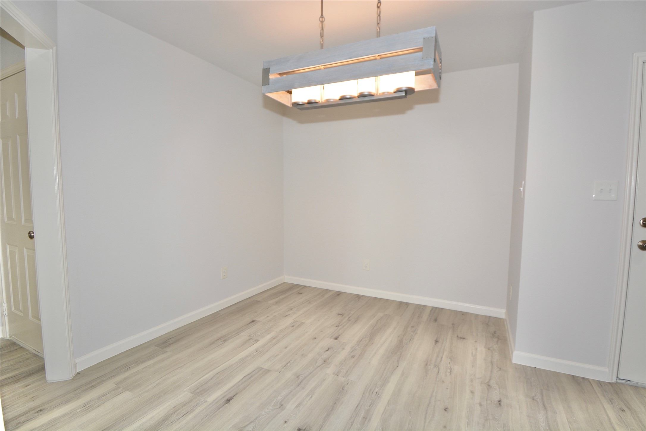 2020 Ward Street Rosenberg, TX 77471 - Photo 5 of 19 a view of a small space with wooden floor and a window