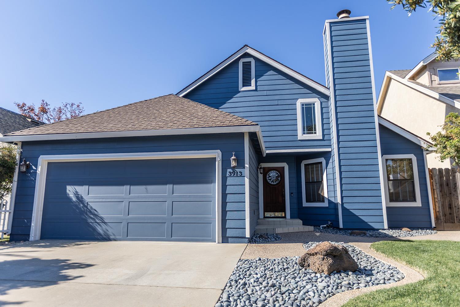 3913 Cougar Place Modesto, CA 95356 - Photo 2 of 40 a front view of a house