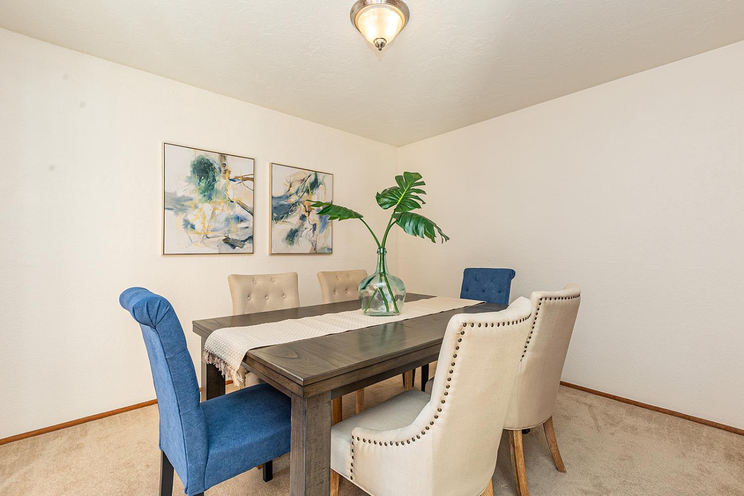 3913 Cougar Place Modesto, CA 95356 - Photo 22 of 40 a view of a dining room with furniture
