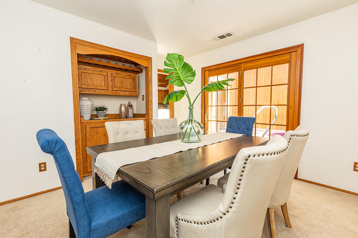 3913 Cougar Place Modesto, CA 95356 - Photo 25 of 40 a view of a dining room with furniture window and outside view