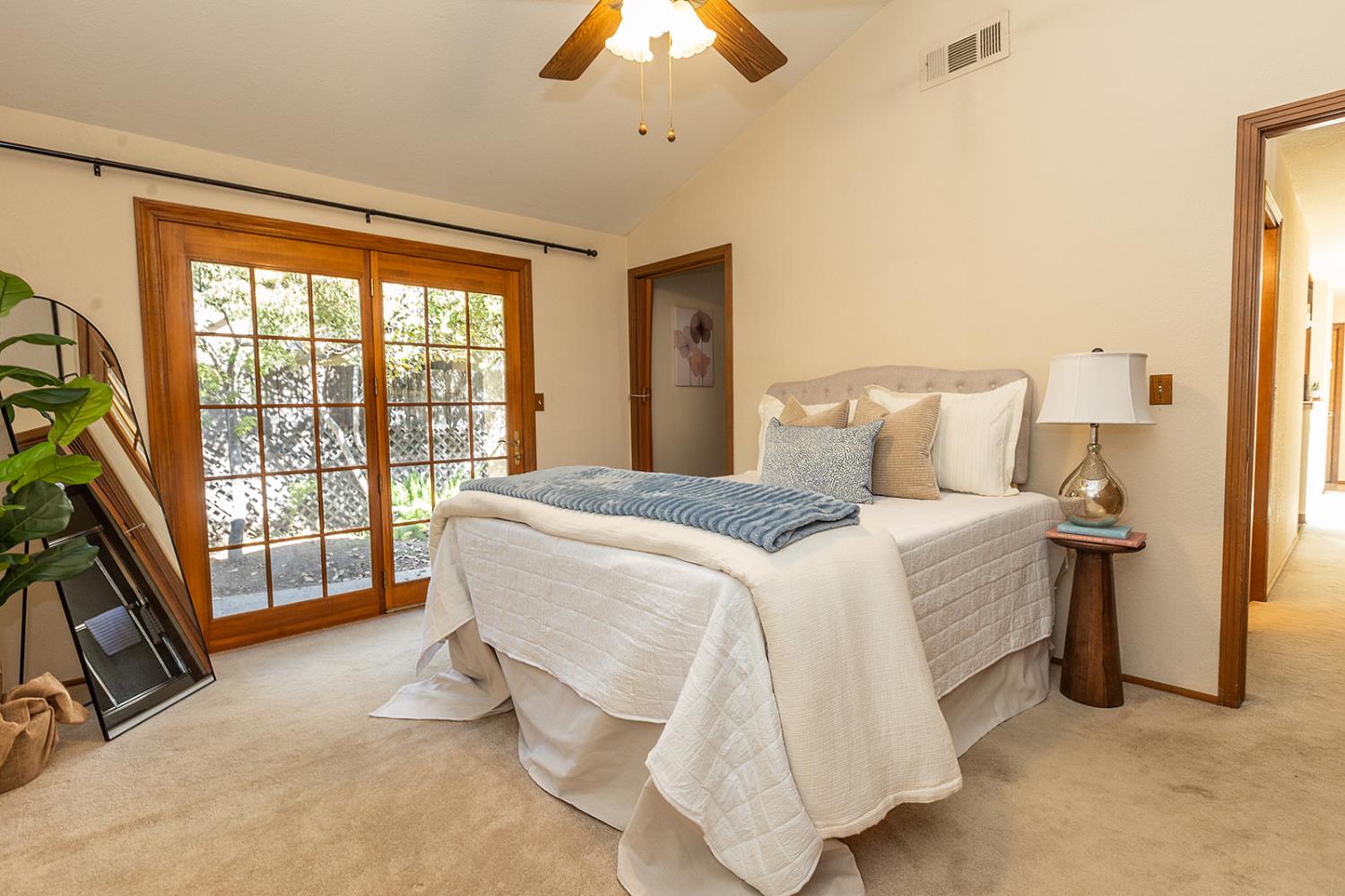 3913 Cougar Place Modesto, CA 95356 - Photo 28 of 40 a bedroom with a bed and a large window