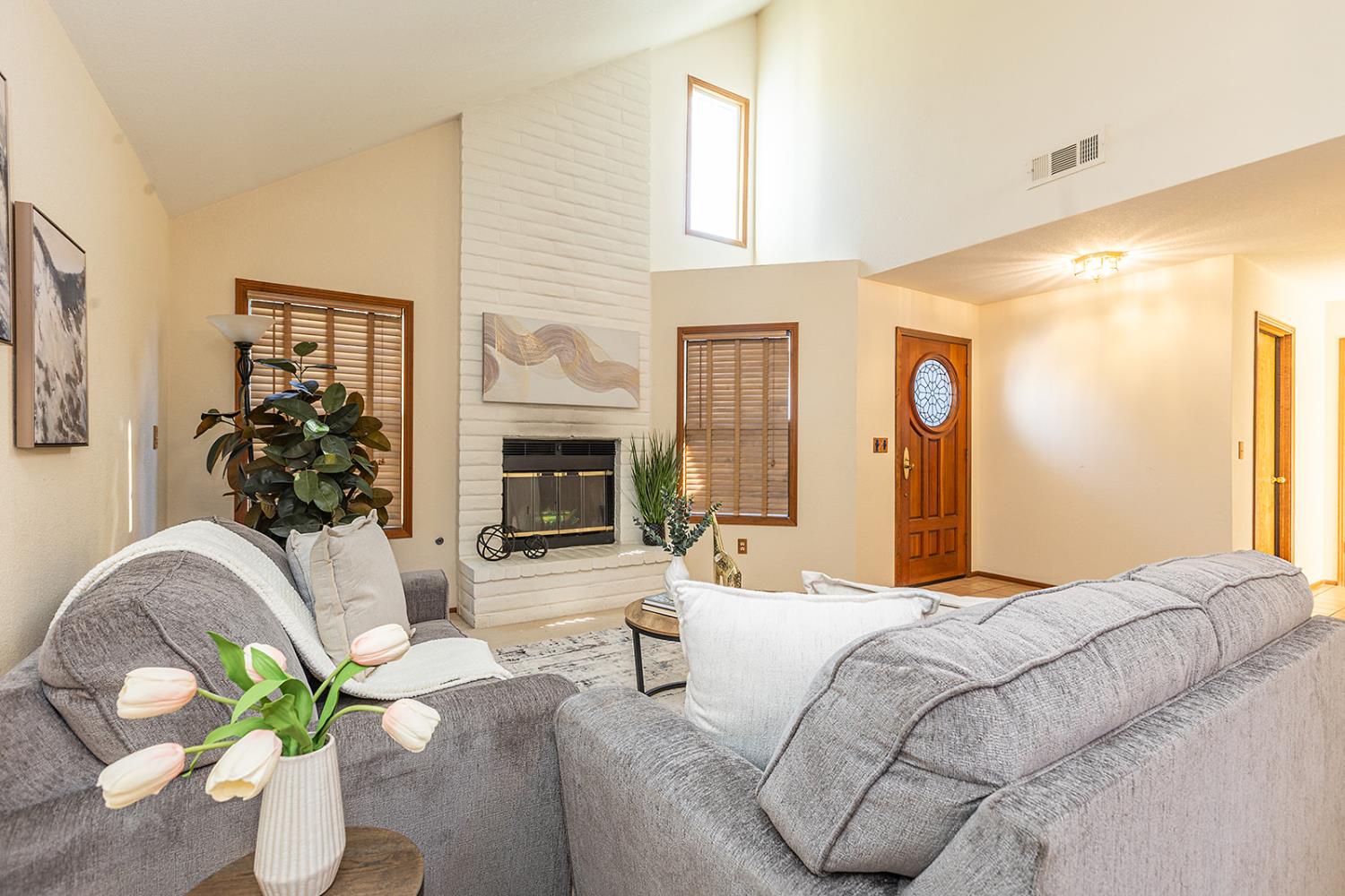 3913 Cougar Place Modesto, CA 95356 - Photo 9 of 40 a bedroom with a bed mirror and couch