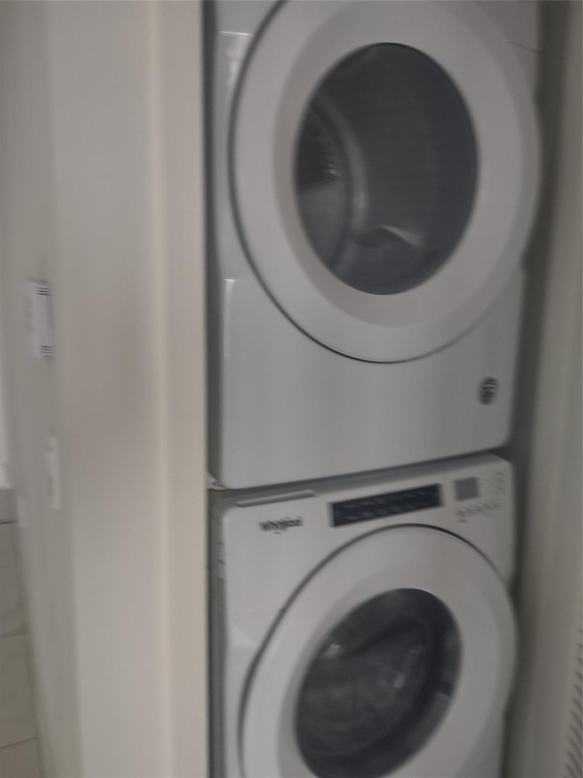 2000 Metropica Way, Unit 507 Sunrise, FL 33323 - Photo 12 of 13 a utility room with dryer and washer
