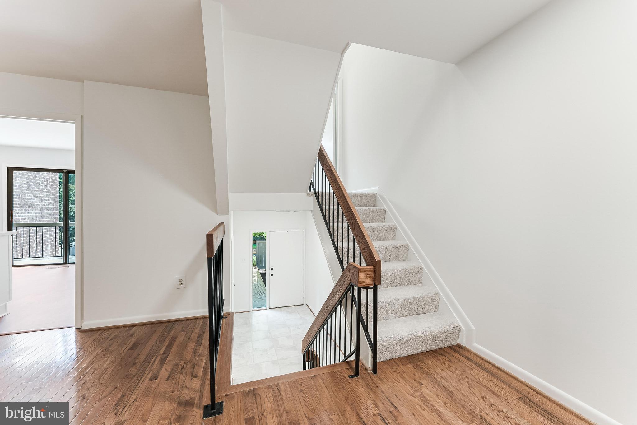 12023 Insha Court Reston, VA 20191 - Photo 16 of 52 a view of entryway with wooden floor
