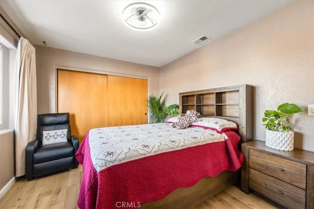 a view of street with wooden fence