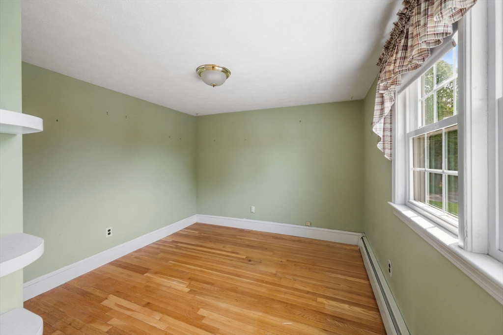 40 Bell Road Weymouth, MA 02188 - Photo 34 of 41 a view of empty room with wooden floor