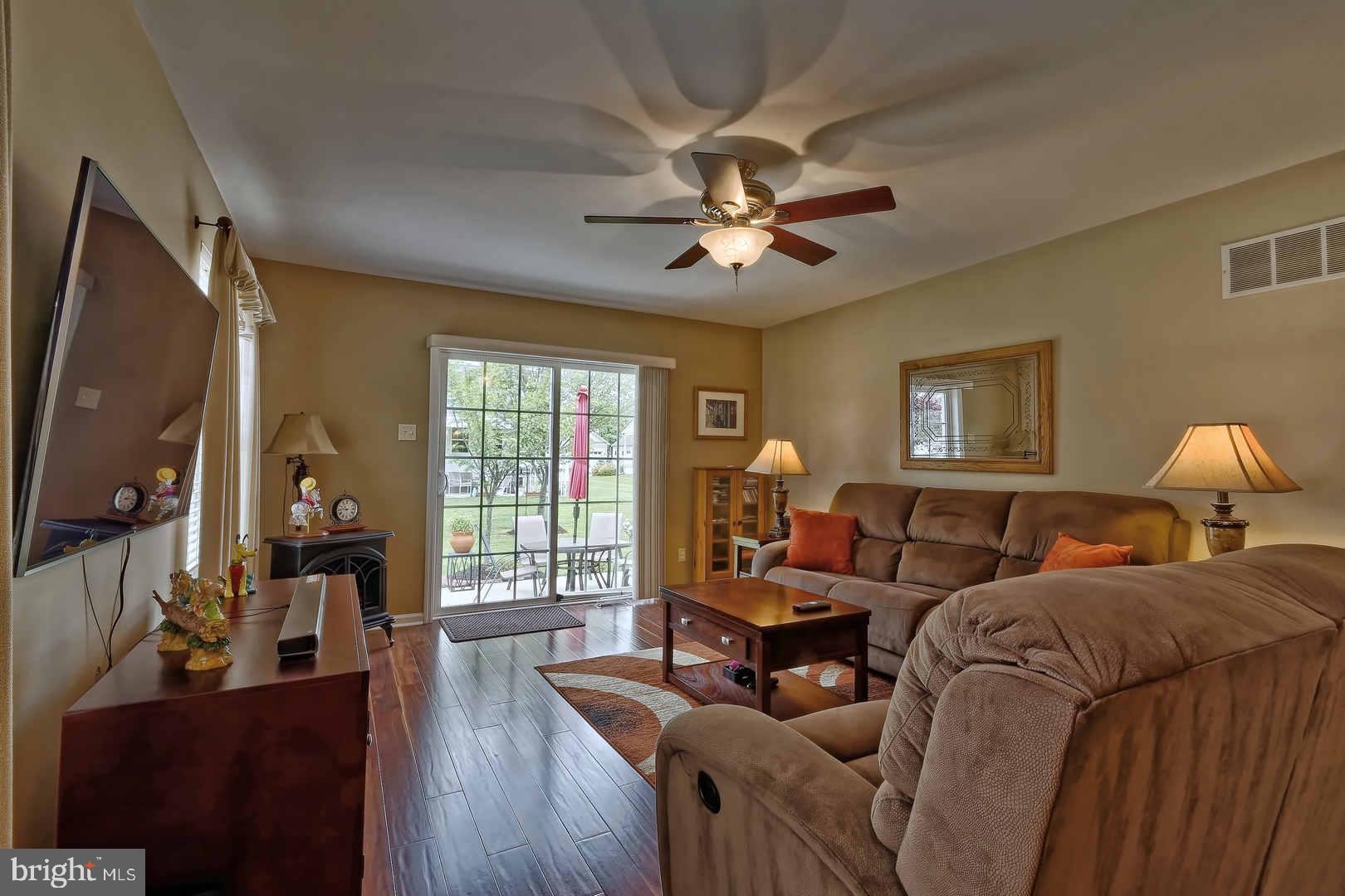 16 Eagle Ridge Drive Mantua, NJ 08051 - Photo 5 of 24 Living room sliders lead to back patio.