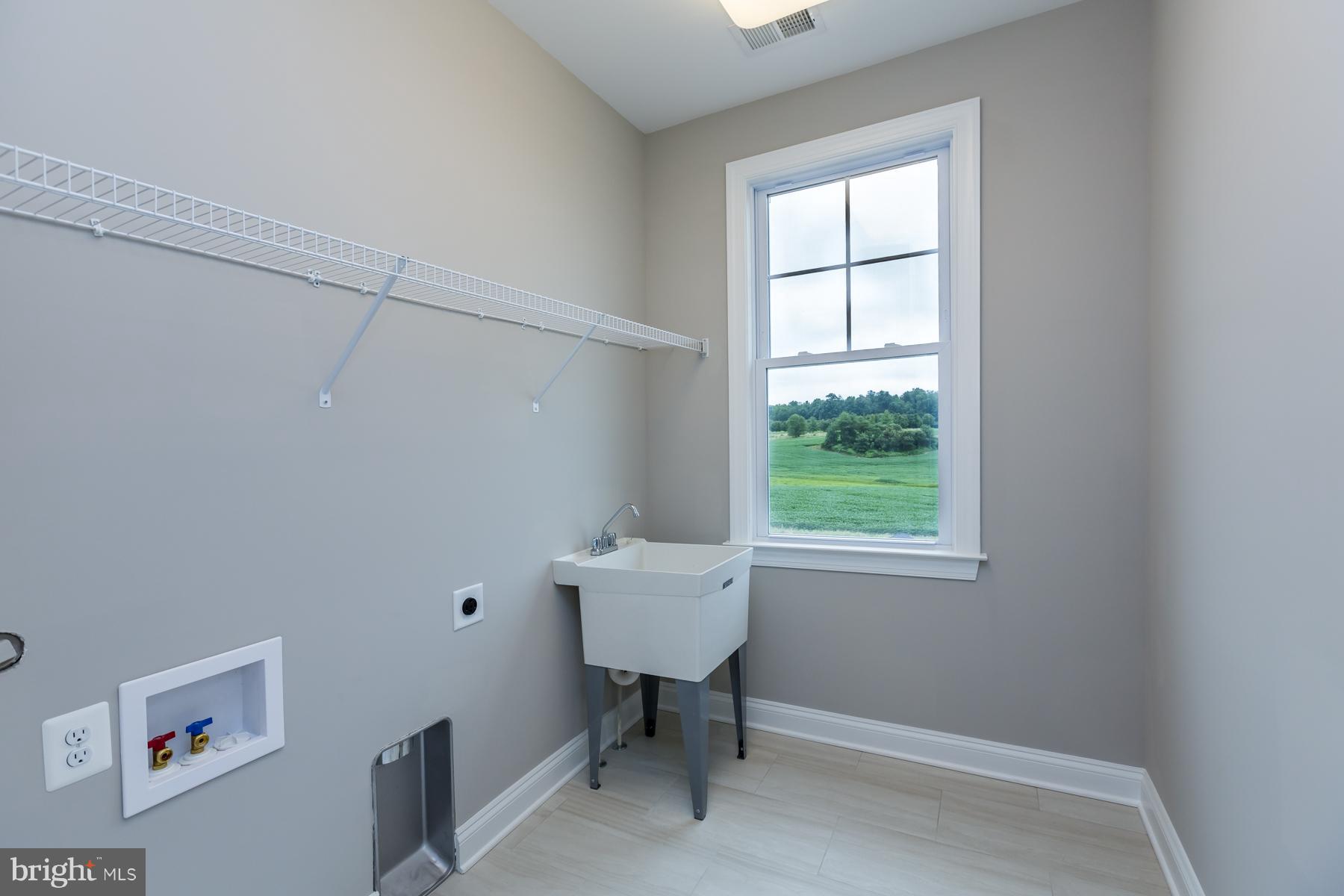 4080 Carrollton Road Upperco, MD 21155 - Photo 21 of 30 Upper Level Laundry Room w/ Full Size Utility Sink