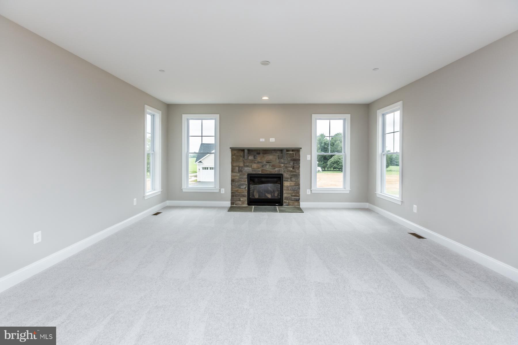 4080 Carrollton Road Upperco, MD 21155 - Photo 9 of 30 Spacious Family Room with Stone Gas Fireplace