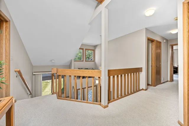a bathroom with a sink a toilet and shower curtain