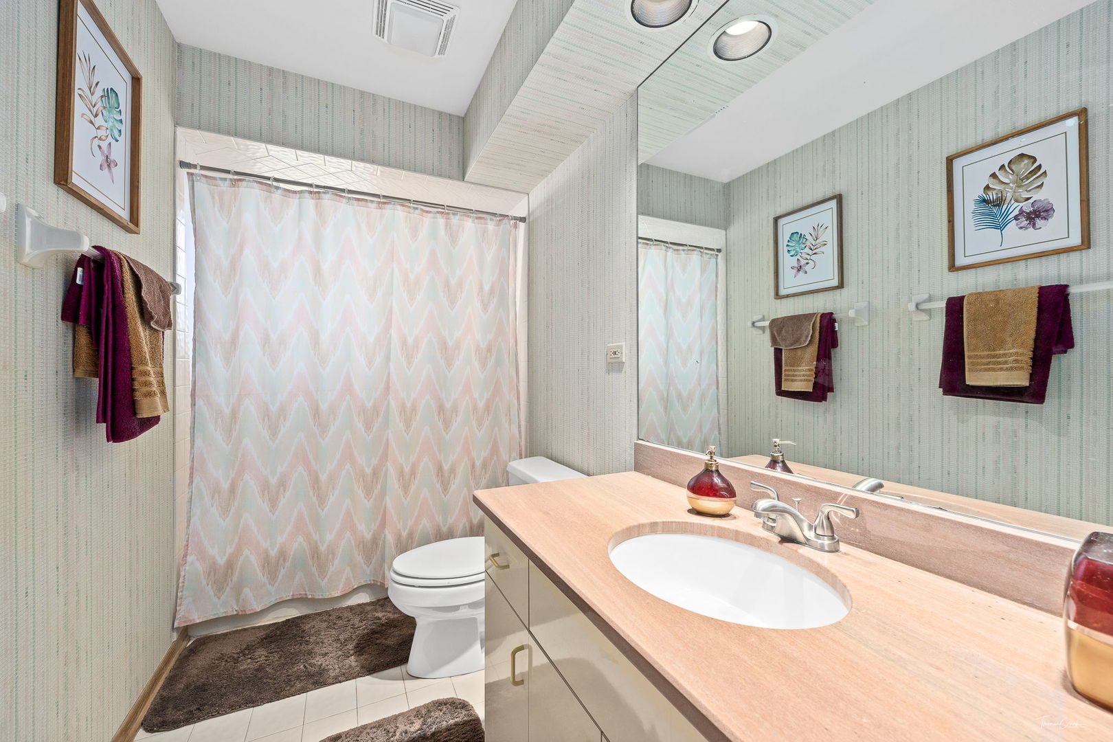 20 Geneva Court Crete, IL 60417 - Photo 29 of 34 a bathroom with a sink a toilet and shower curtain