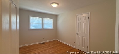 1070 Rulnick Street Fayetteville, NC 28304 - Photo 13 of 15 an empty room with windows