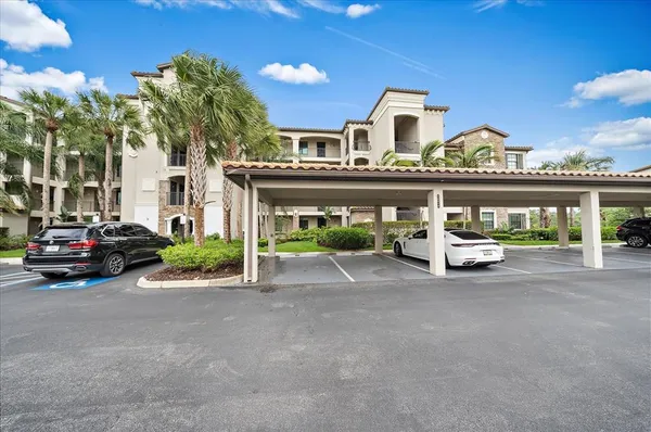 a view of a car park in front of house