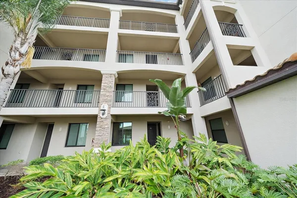 a front view of a multi story residential apartment building
