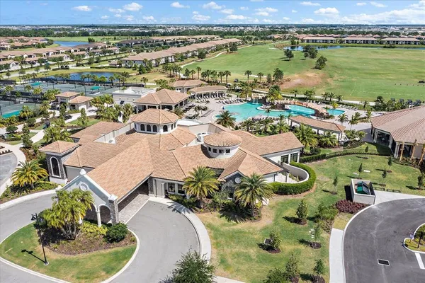 an aerial view of a house with a lake view
