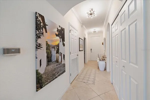a view of a hallway and interior of the house