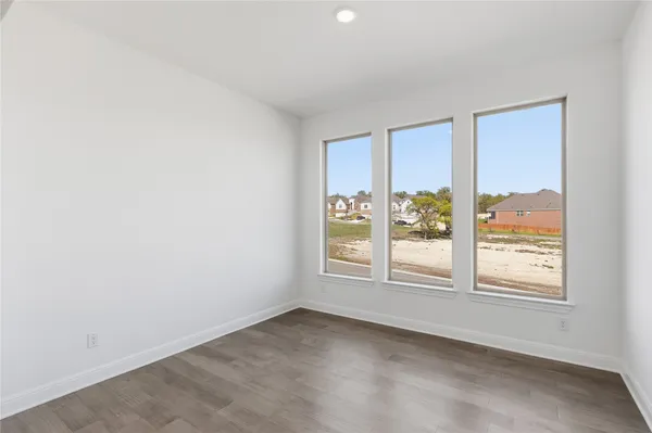 an empty room with windows