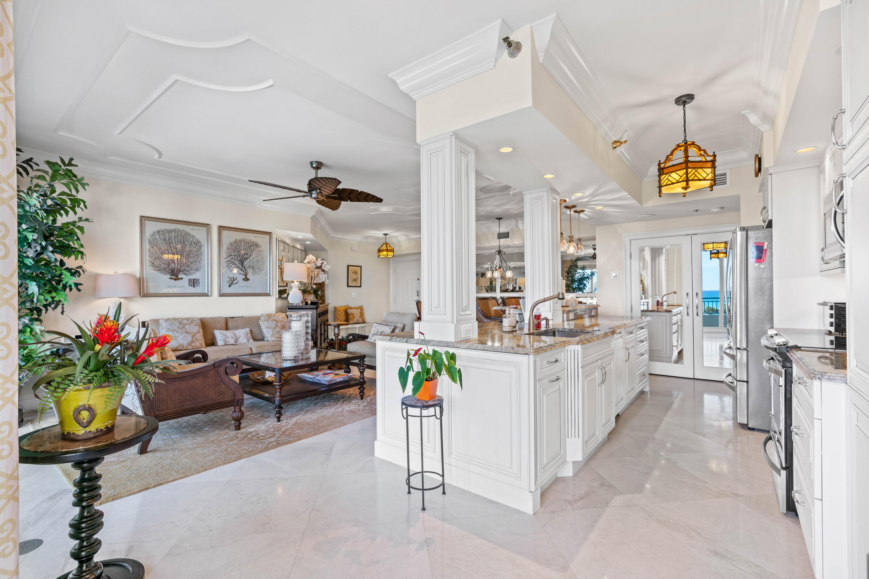 2000 Florida A1A, Unit 406 Jupiter, FL 33477 - Photo 12 of 40 a living room filled with furniture