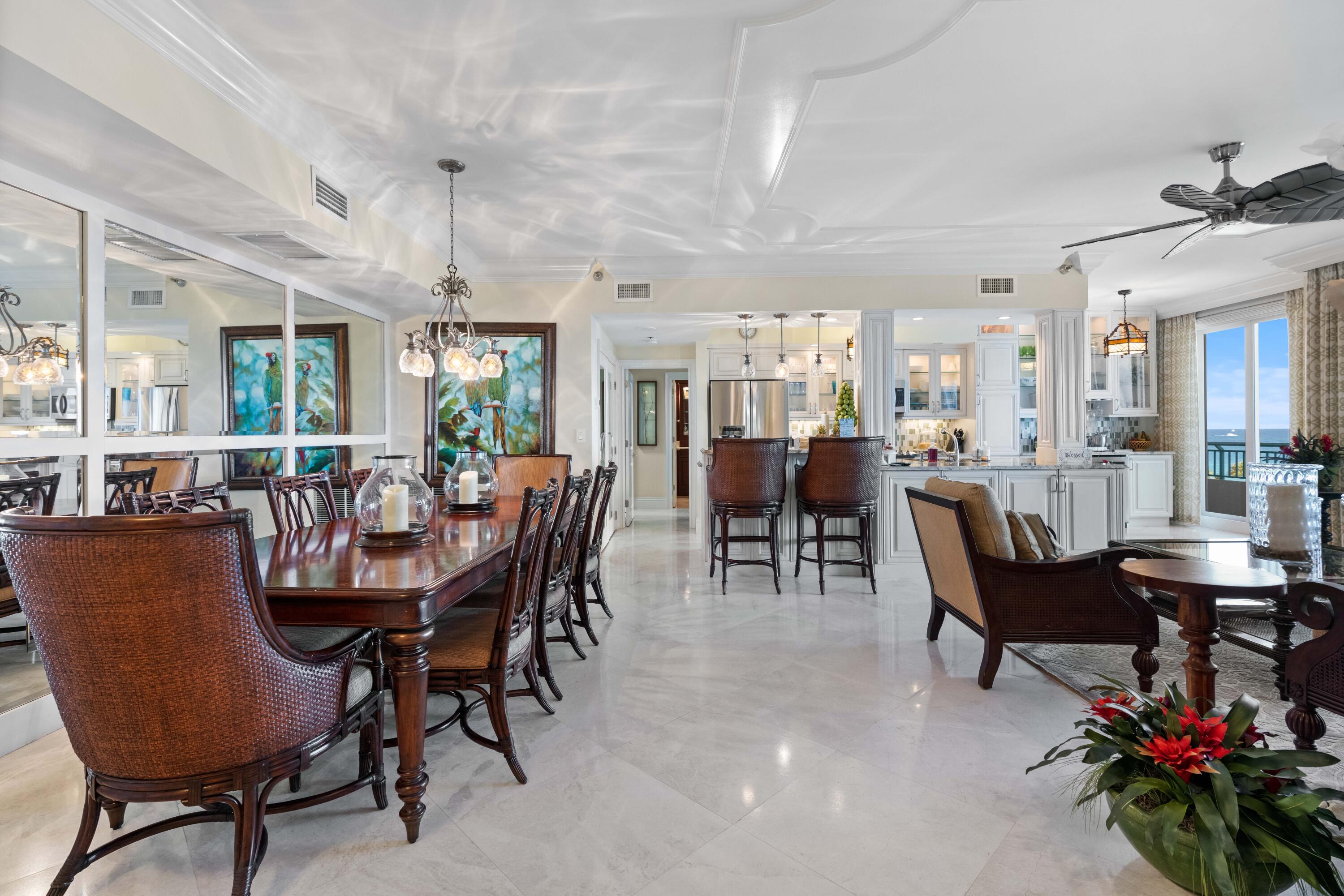 2000 Florida A1A, Unit 406 Jupiter, FL 33477 - Photo 13 of 40 a view of a dining room with furniture