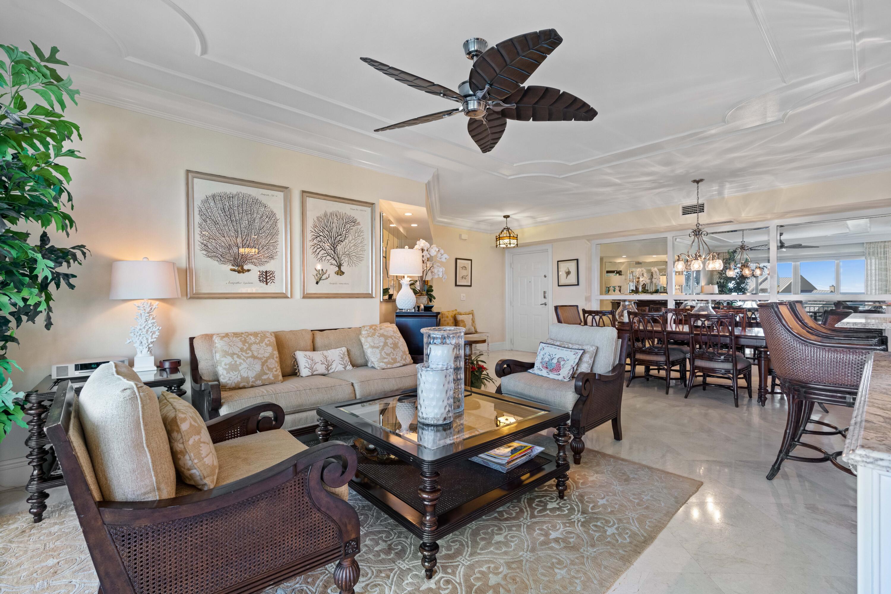 2000 Florida A1A, Unit 406 Jupiter, FL 33477 - Photo 14 of 40 a living room with furniture and a large window