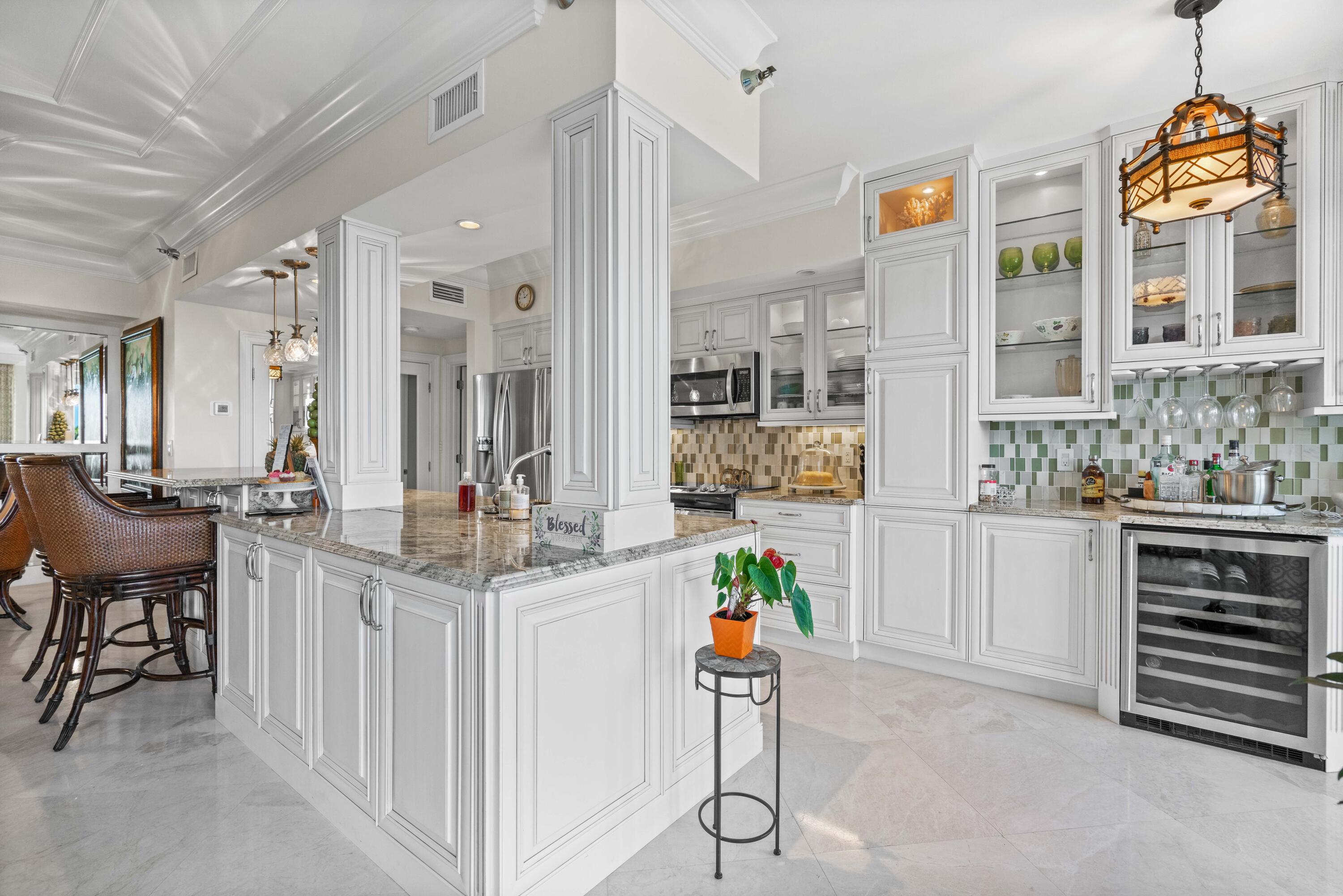 2000 Florida A1A, Unit 406 Jupiter, FL 33477 - Photo 15 of 40 a very nice looking kitchen with a lot of counter space and a sink