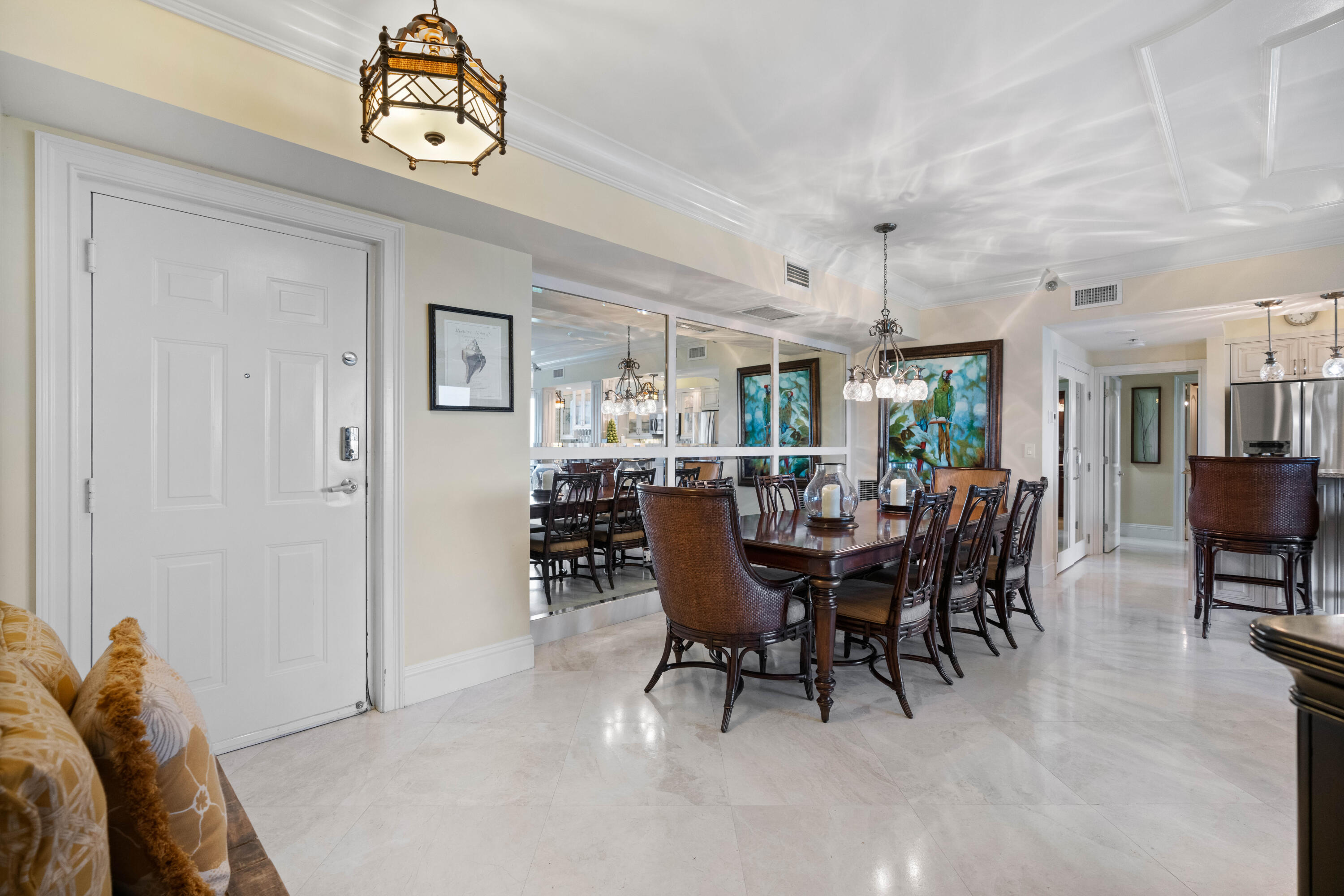 2000 Florida A1A, Unit 406 Jupiter, FL 33477 - Photo 7 of 40 a view of a dining room with furniture