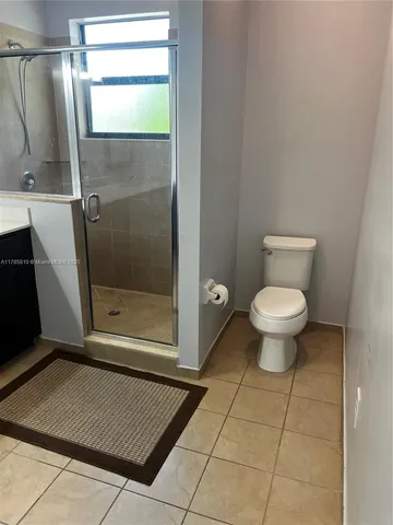 an empty room with wooden floor