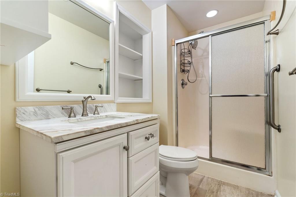 3003 South Holden Road, Unit D Greensboro, NC 27407 - Photo 16 of 32 Bedroom 2 is Virtually Staged