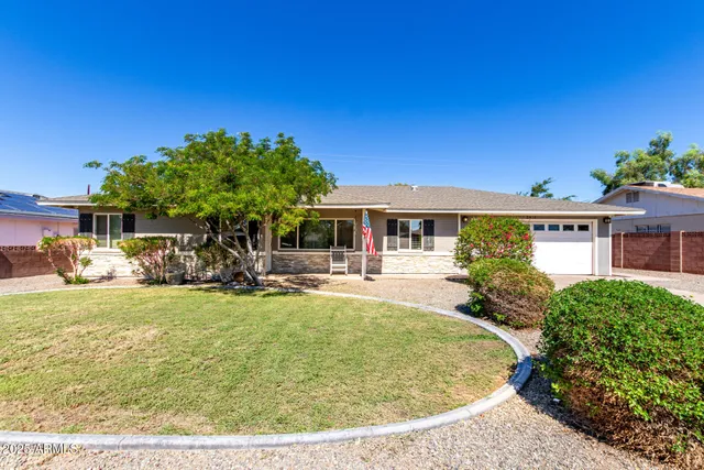 a view of a house with swimming pool