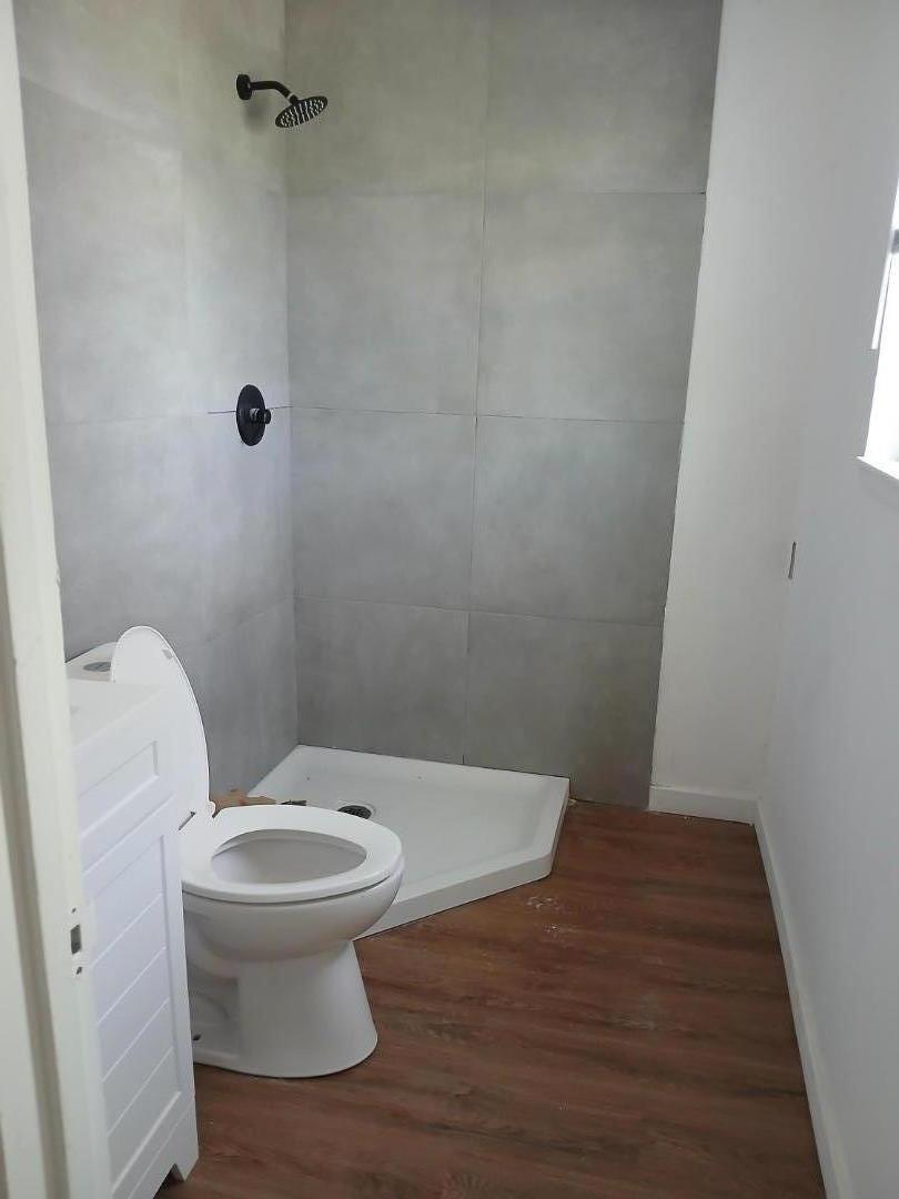 665 West Tyler Island Bridge Road Isleton, CA 95641 - Photo 15 of 19 a bathroom with a toilet and a shower
