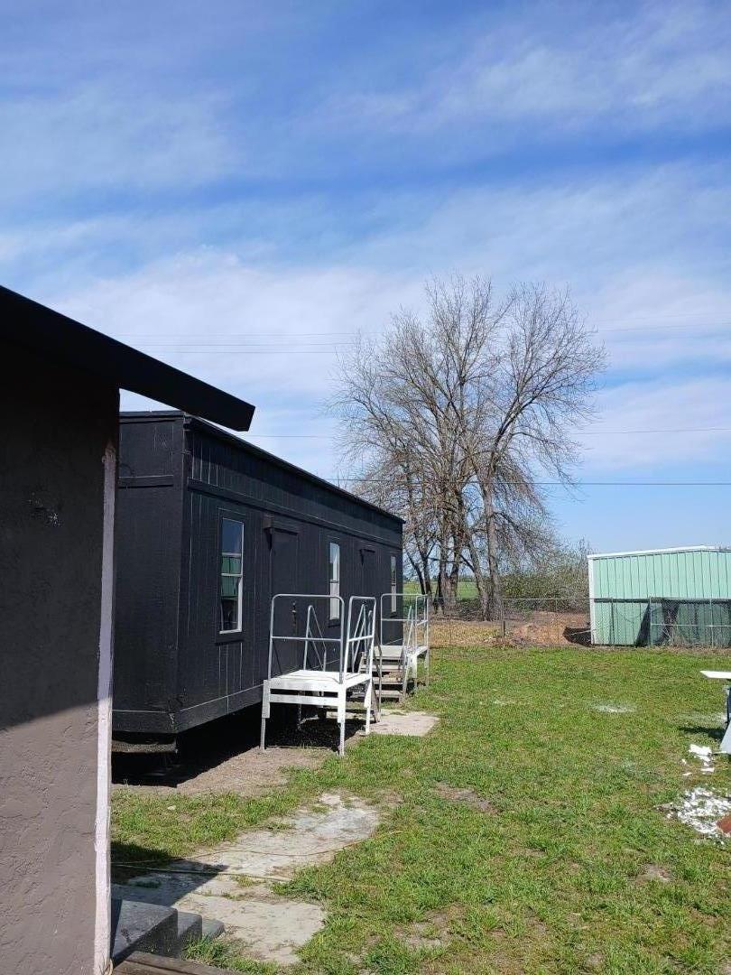 665 West Tyler Island Bridge Road Isleton, CA 95641 - Photo 19 of 19 a view of a house with a yard