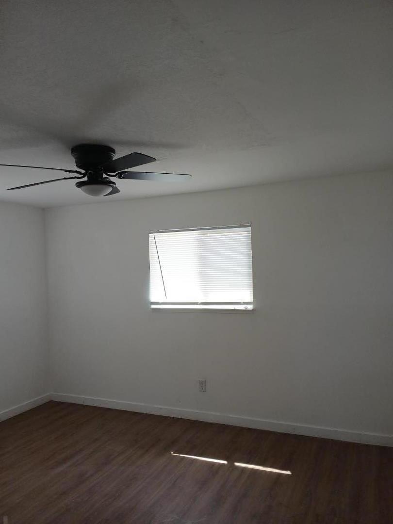 665 West Tyler Island Bridge Road Isleton, CA 95641 - Photo 5 of 19 an empty room with a window