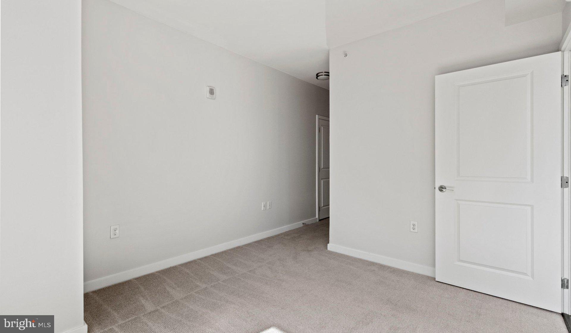 8300 Wisconsin Avenue, Unit 1B1841 Bethesda, MD 20814 - Photo 115 of 150 a view of an empty room