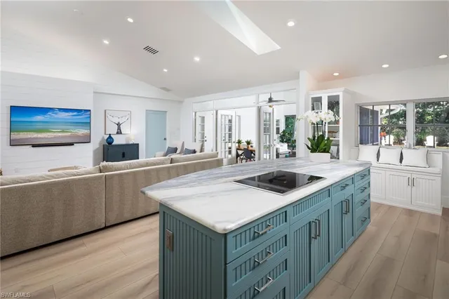 a kitchen with a stove and a sink