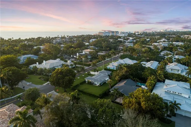 a view of a backyard with swimming pool