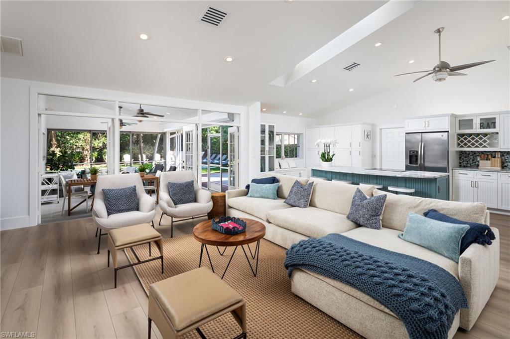 339 4th Avenue North Naples, FL 34102 - Photo 5 of 48 a living room with furniture and a large window