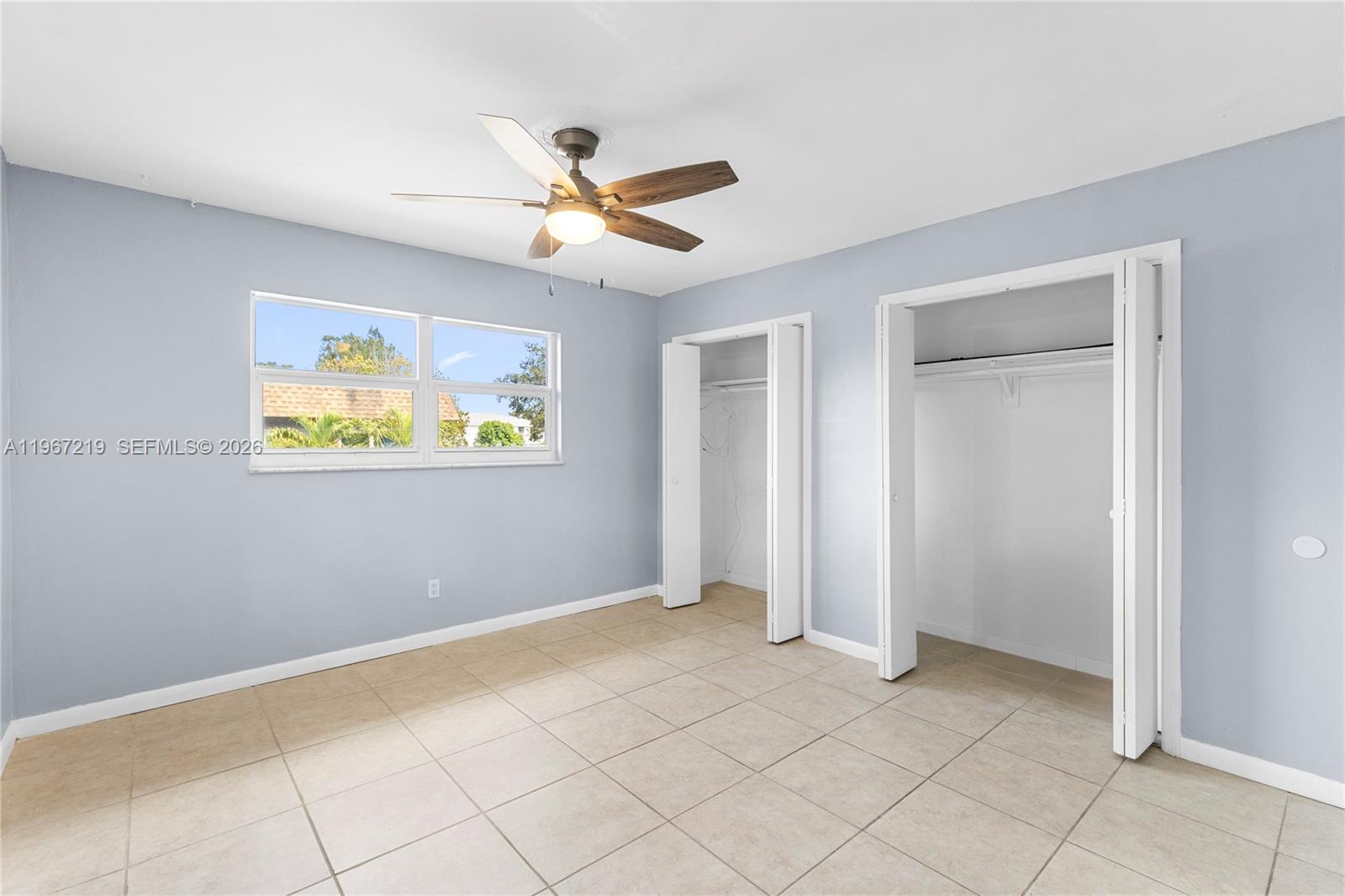 3265 Griffin Road, Unit 206 Dania Beach, FL 33312 - Photo 3 of 15 a view of an empty room with window
