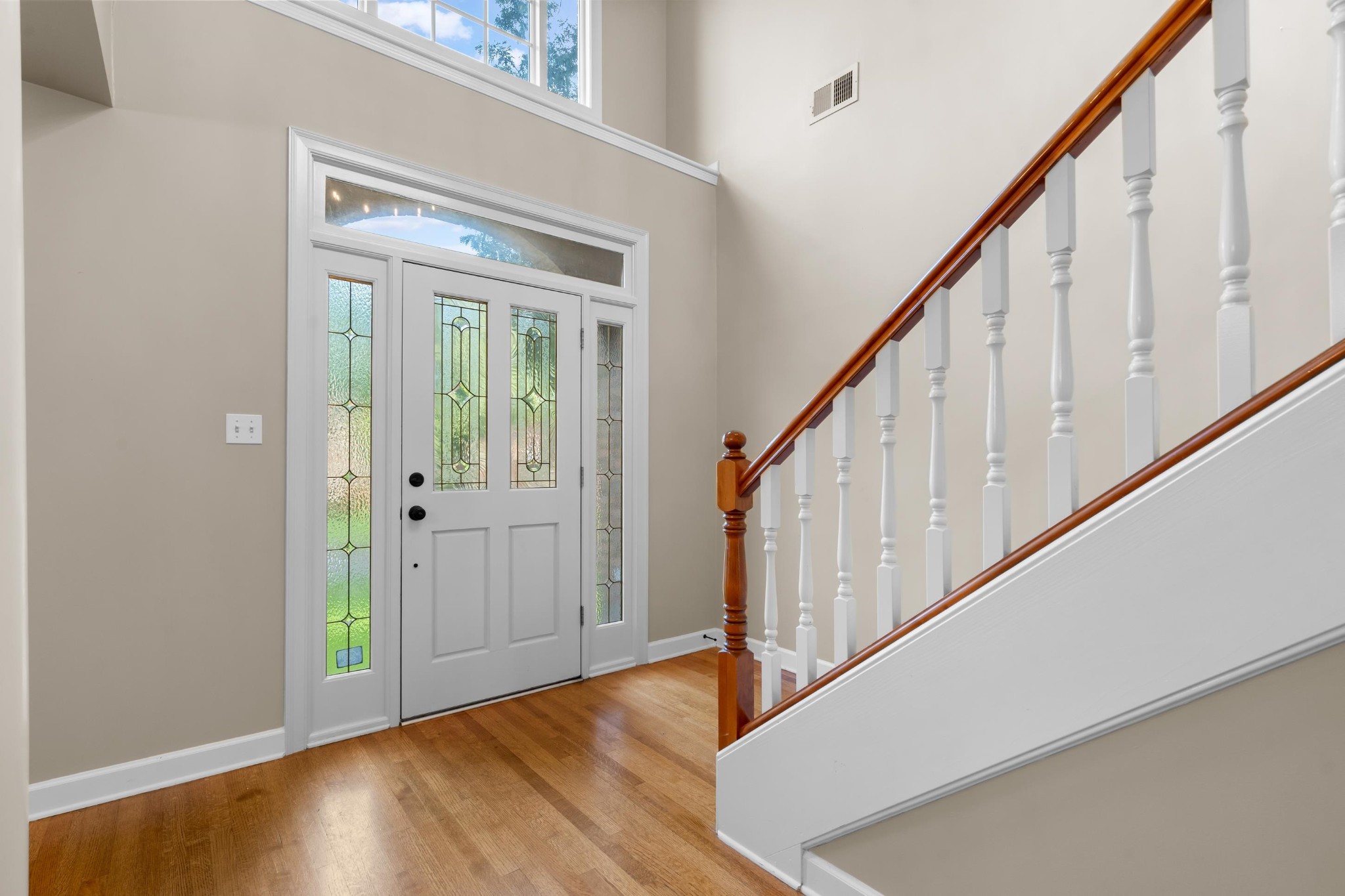 927 Oakmont Ridge Cove Collierville, TN 38017 - Photo 11 of 40 a view of an entryway with wooden floor
