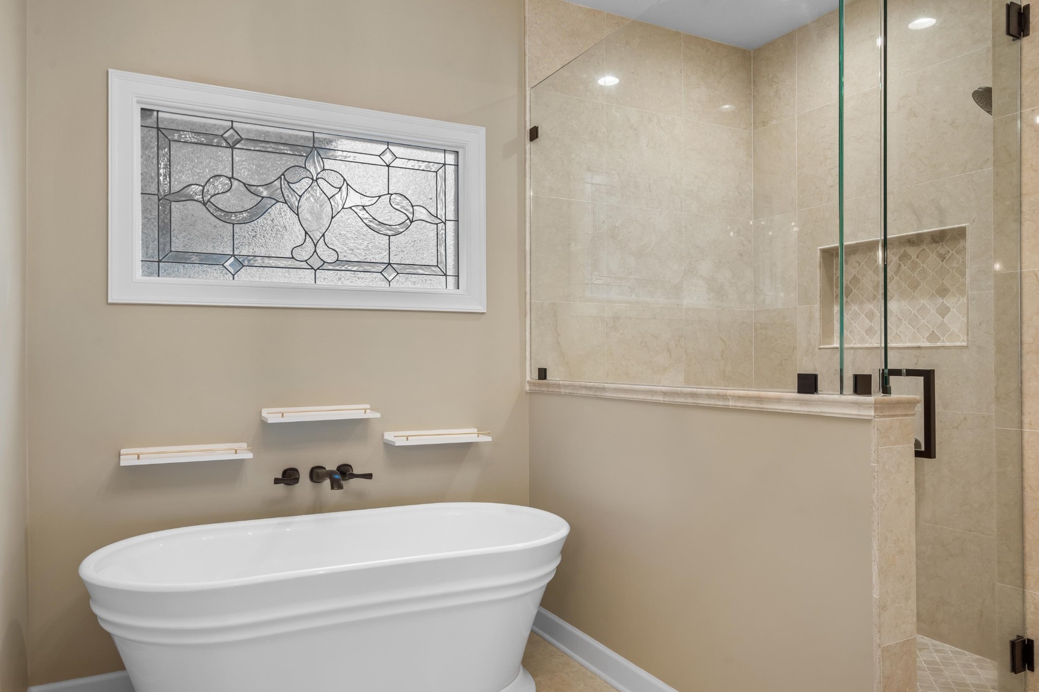 927 Oakmont Ridge Cove Collierville, TN 38017 - Photo 18 of 40 a bathroom with a toilet a sink and mirror