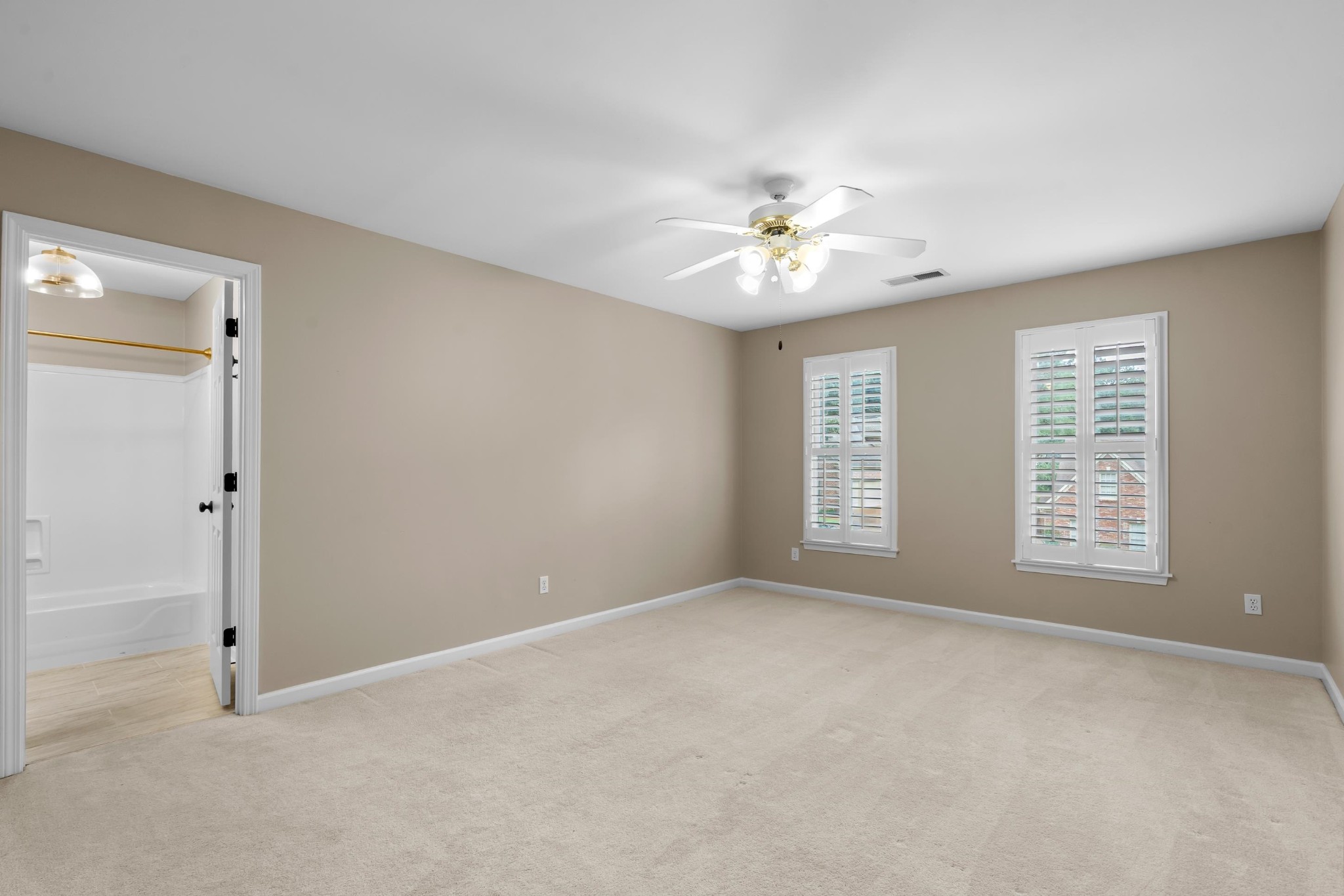 927 Oakmont Ridge Cove Collierville, TN 38017 - Photo 27 of 40 a view of an empty room with a window