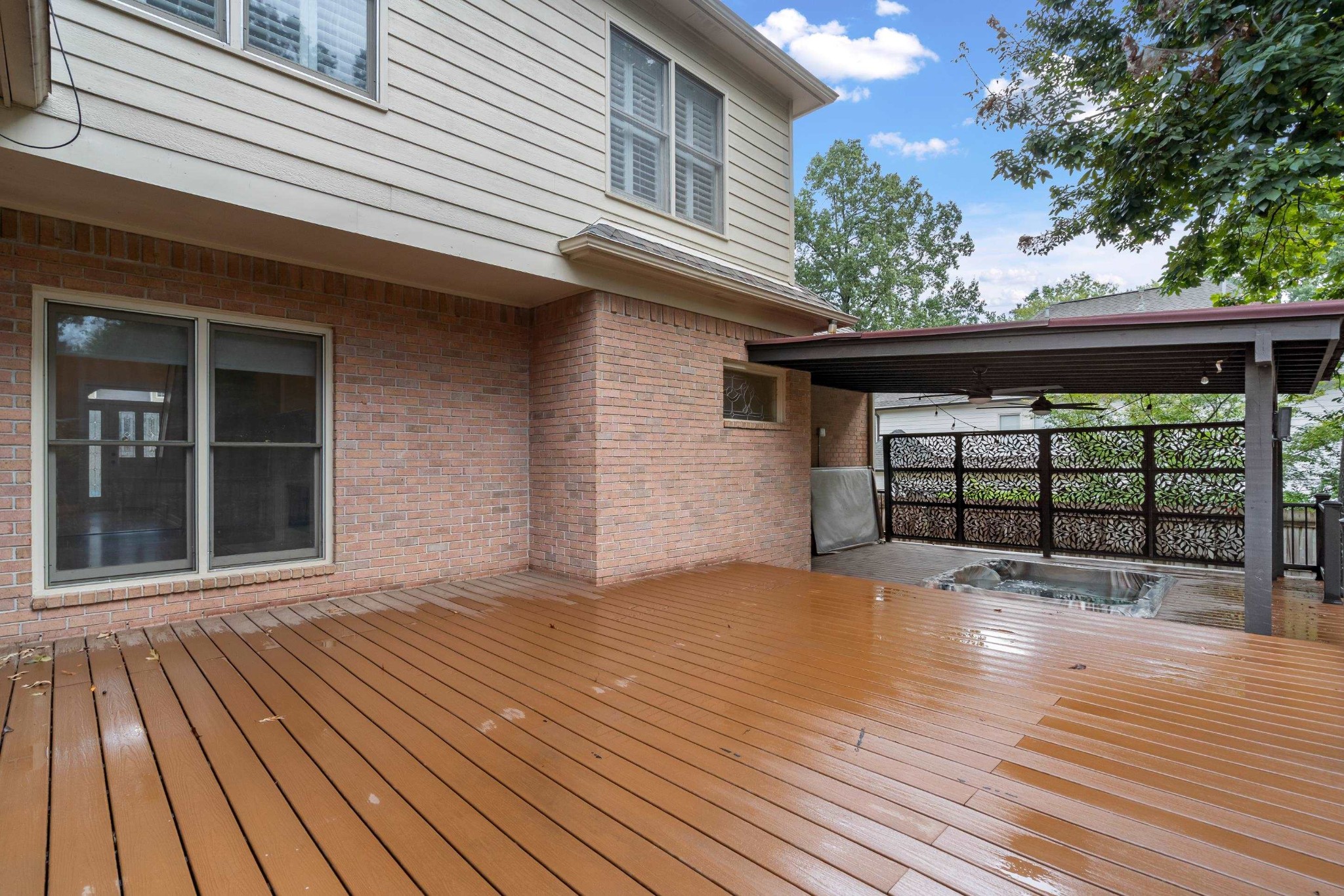 927 Oakmont Ridge Cove Collierville, TN 38017 - Photo 33 of 40 a view of backyard with a deck and wooden floor