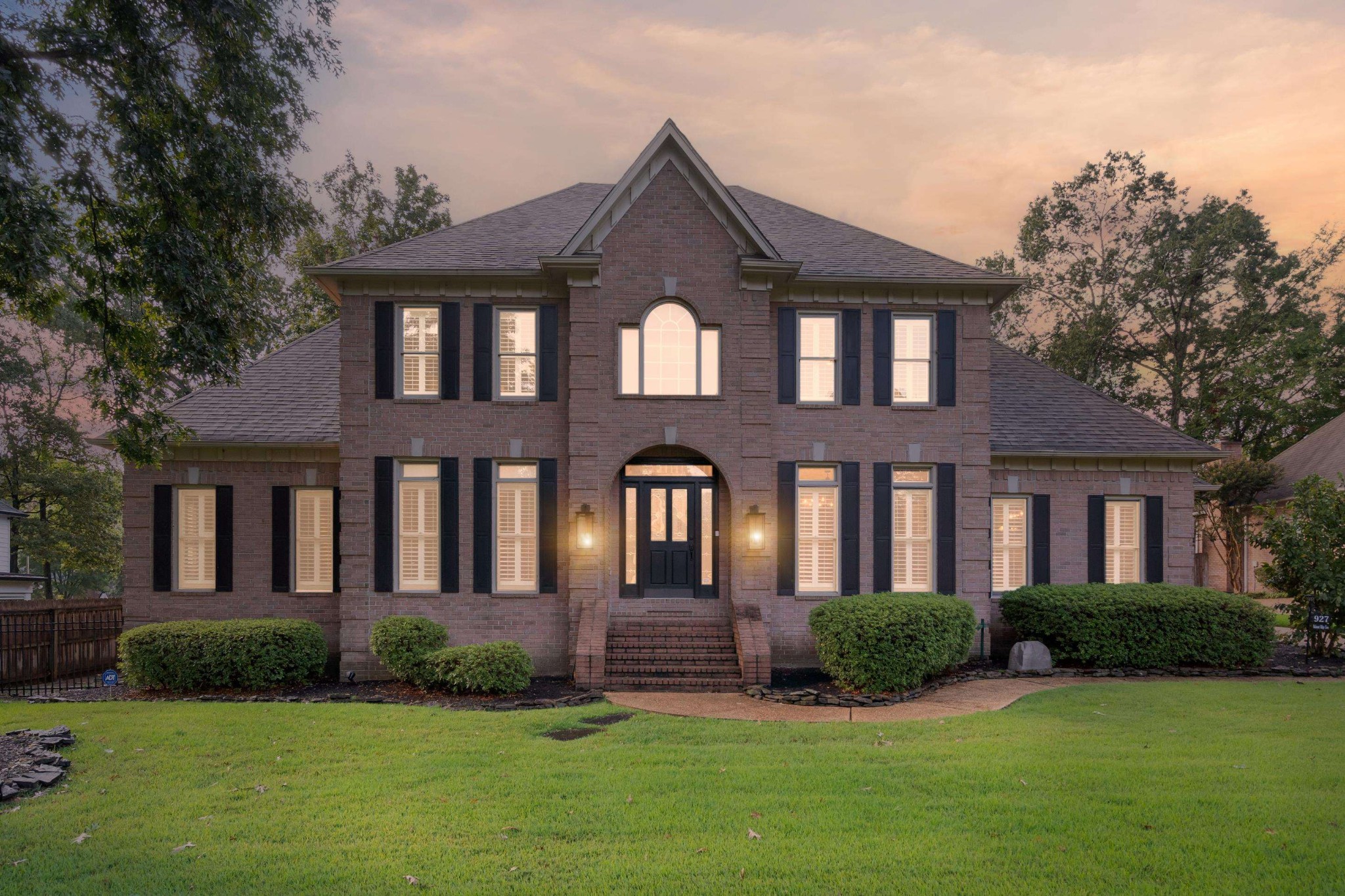 927 Oakmont Ridge Cove Collierville, TN 38017 - Photo 36 of 40 a front view of a house with a yard