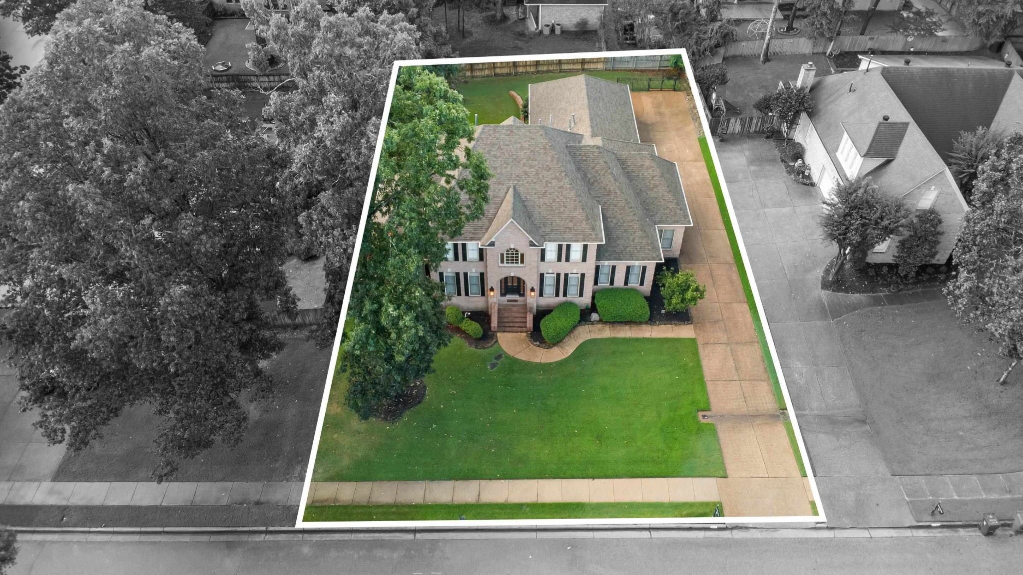 927 Oakmont Ridge Cove Collierville, TN 38017 - Photo 39 of 40 a view of a yard in front of a house