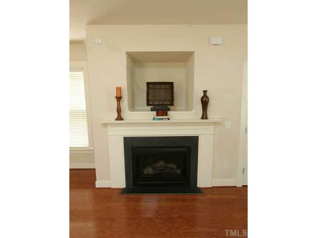 4613 All Points View Way Raleigh, NC 27614 - Photo 5 of 25 Family room features gas log fireplace and room for the nice flat screen TV.