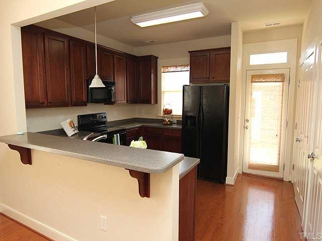 4613 All Points View Way Raleigh, NC 27614 - Photo 7 of 25 View of the kitchen. Counter bar extends entertaining space.