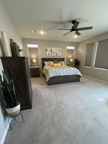 a bathroom with a sink a vanity and mirror